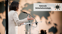 Federal Foreign Minister Annalena Baerbock in portrait during her speech with world map in the background at the event Towards a National Security Strategy at the Foreign Office in Berlin