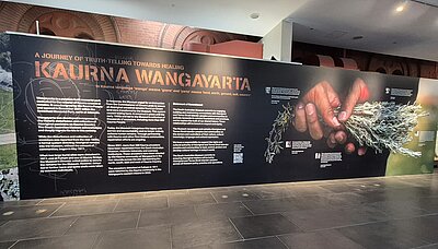 Information panel on the terms Truth/Reconciliation/Healing in the lobby of the South Australian Museum.